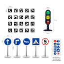 Collection of road signs with dimensions and a traffic light model on a white background